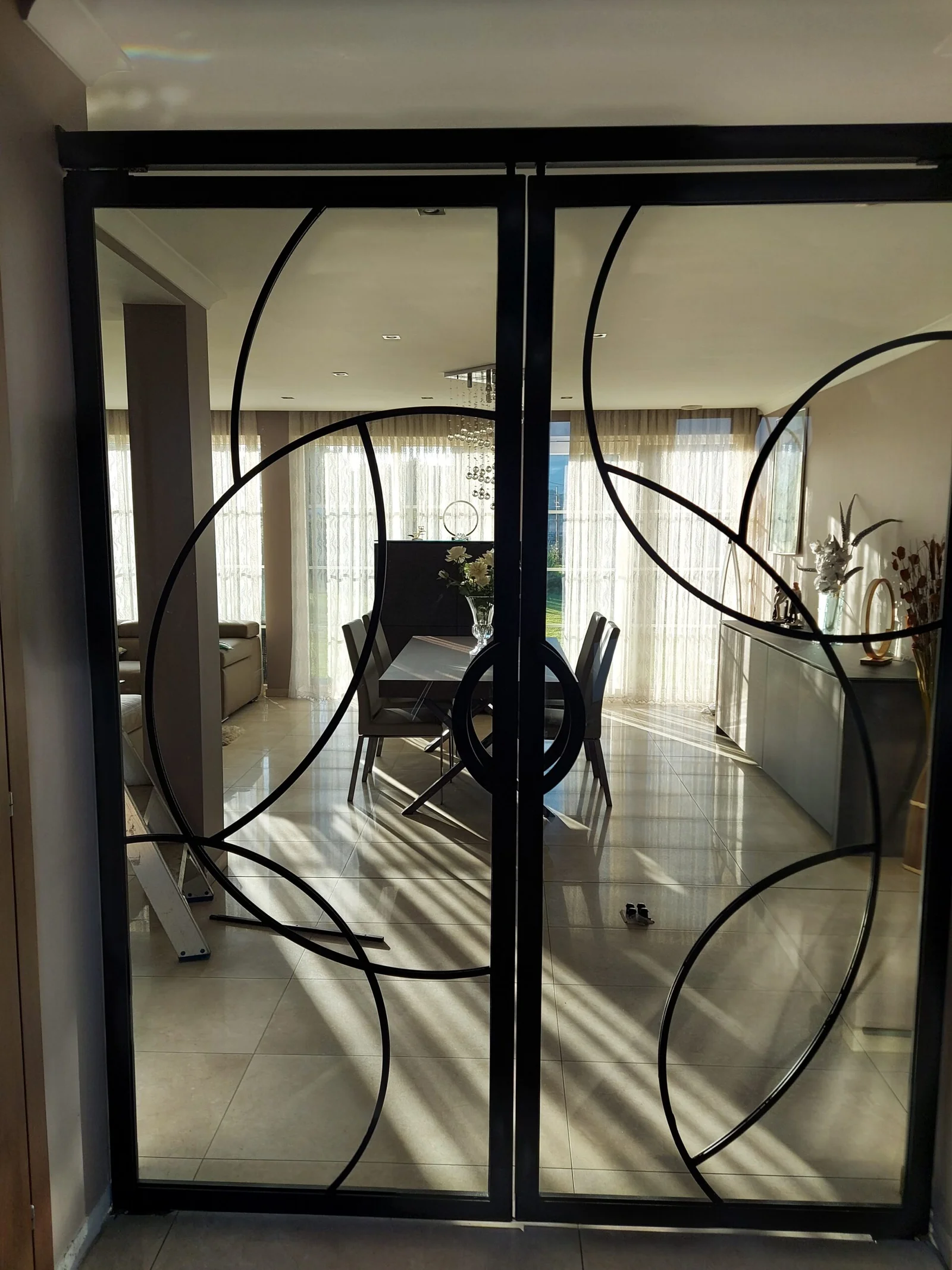 double porte vitrée inserts courbes